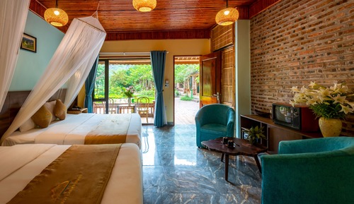 Habitación cuádruple Deluxe, varias camas, vistas al jardín