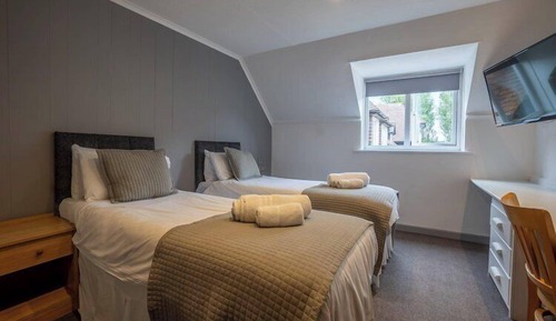 Habitación Confort con 2 camas individuales, vistas al patio