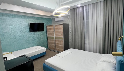 Habitación triple Deluxe