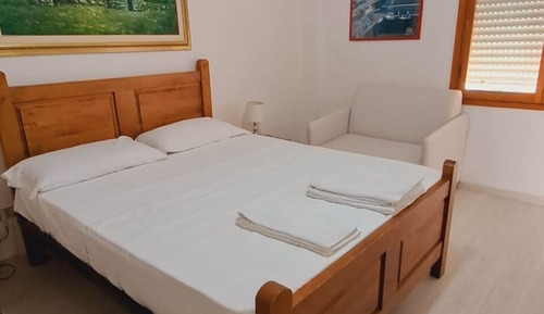 Habitación cuádruple, varias camas