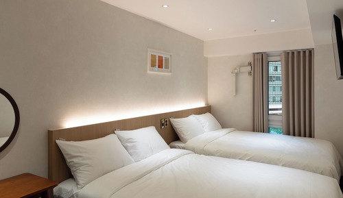 Habitación familiar con 2 camas individuales