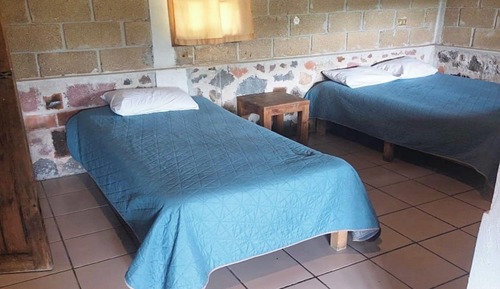 Habitación familiar, varias camas