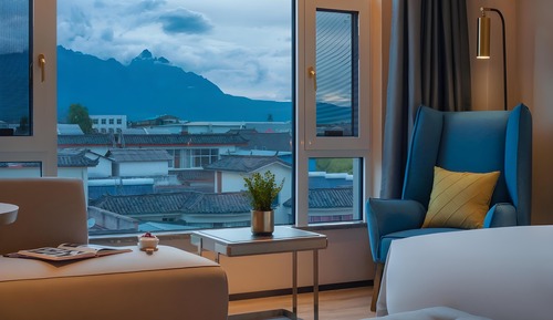 Habitación superior con 2 camas individuales, vistas a la ciudad