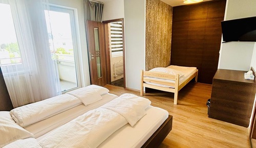 Habitación triple Confort, balcón, vistas a la ciudad