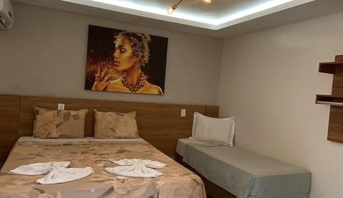 Habitación triple Confort, varias camas, baño privado
