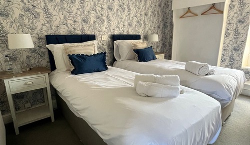 Habitación con 2 camas individuales