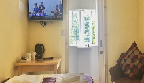 Habitación Confort doble, baño privado, vistas al jardín