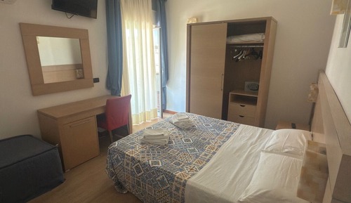 Habitación Confort con 1 cama doble o 2 individuales