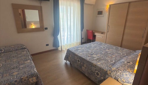 Habitación triple Deluxe