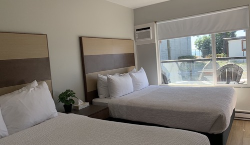 Habitación, 2 camas de matrimonio, vistas al jardín