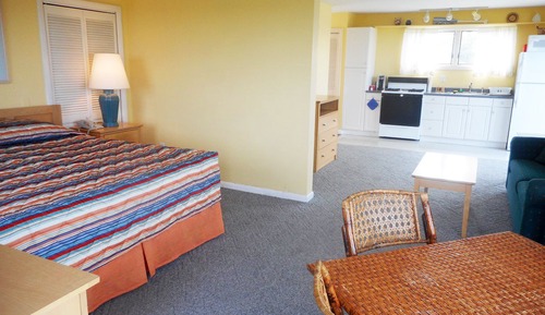 Habitación Deluxe, 1 cama de matrimonio grande con sofá cama, cocina básica, vistas a la bahía