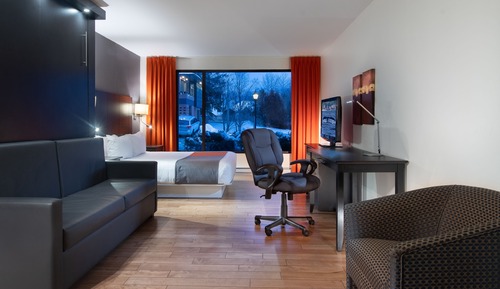 Habitación de diseño, 2 camas de matrimonio, frigorífico y microondas