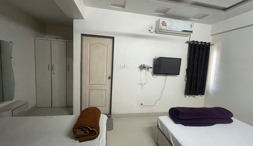 Deluxe Quadruple Room, City View