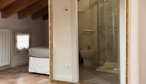 Habitación triple familiar, vistas al patio