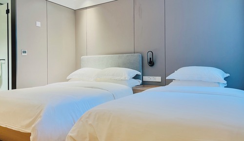 Habitación Confort con 2 camas individuales, en la zona del patio