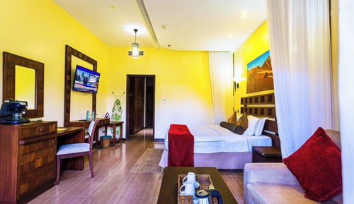 Habitación estándar con 1 cama doble o 2 individuales, balcón, vistas al jardín