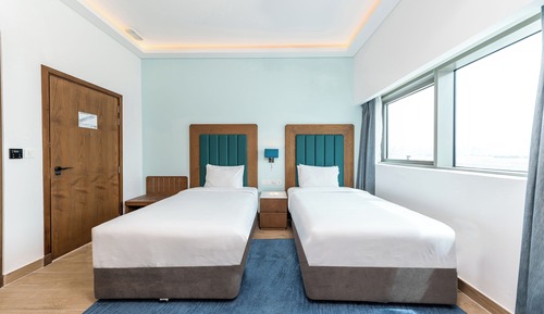 Habitación estándar con 1 cama doble o 2 individuales, vistas a la ciudad