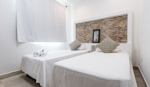 Habitación con 2 camas individuales