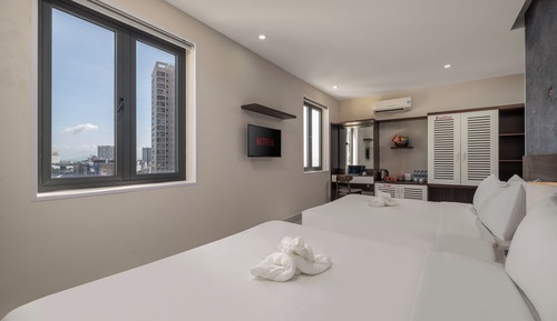 Habitación cuádruple Deluxe, vistas a la ciudad