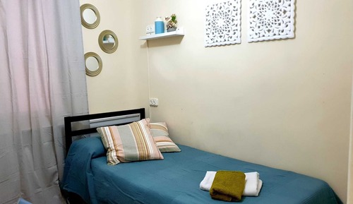 Habitación individual, baño compartido