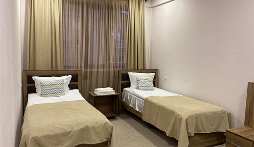 Habitación con 2 camas individuales