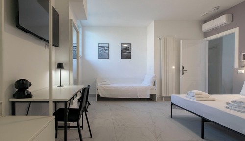 Habitación triple Deluxe, no fumadores, baño privado