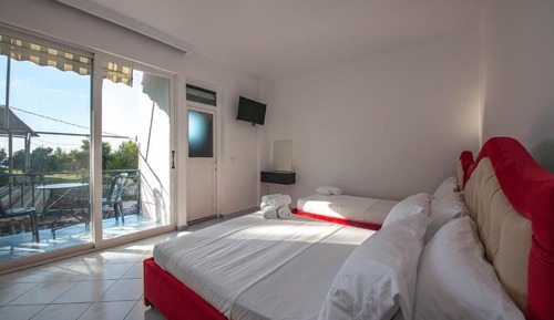 Habitación triple, balcón