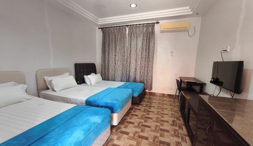 Habitación triple Deluxe