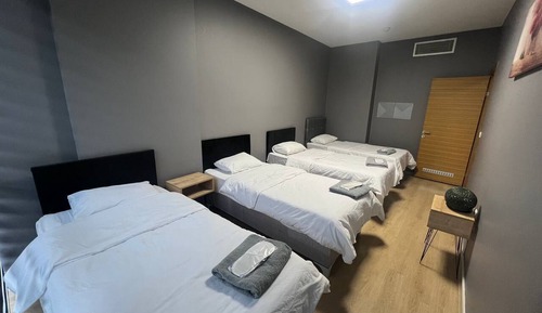 Habitación cuádruple Deluxe