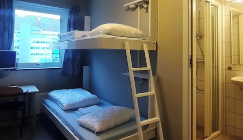 Habitación triple básica, vistas parciales al mar