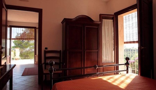 Habitación cuádruple Deluxe, vistas parciales al mar