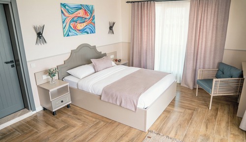 Habitación triple Deluxe, varias camas, terraza, vistas al mar