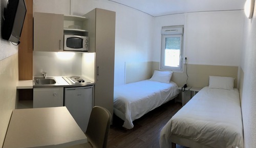 Habitación con 2 camas individuales