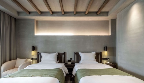 Habitación básica con 2 camas individuales