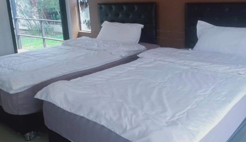 Villa, 2 camas individuales