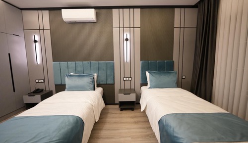 Habitación con 2 camas individuales