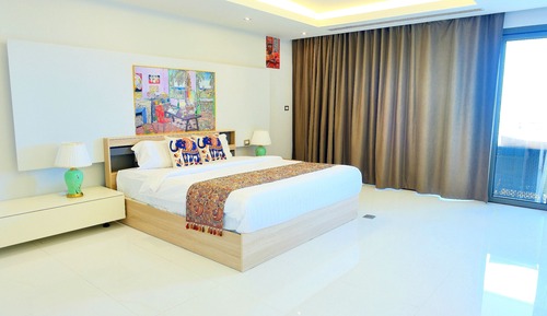 Habitación superior con 2 camas individuales, vistas a la playa