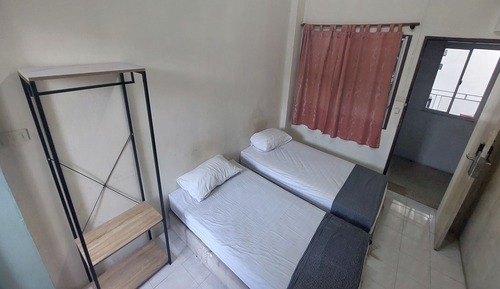 Habitación con 2 camas individuales