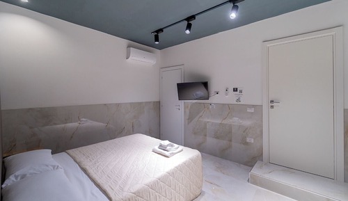 Suite estudio familiar, en edificio anexo (Via A. De Gasperi 55)