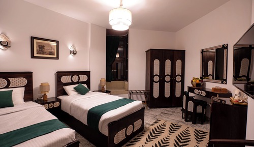 Habitación estándar con 1 cama doble o 2 individuales