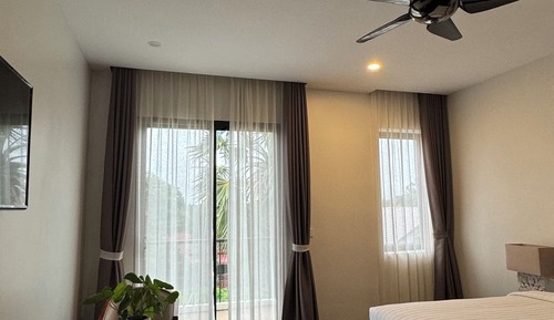 Habitación junior con 1 cama doble o 2 individuales, balcón, vistas al jardín