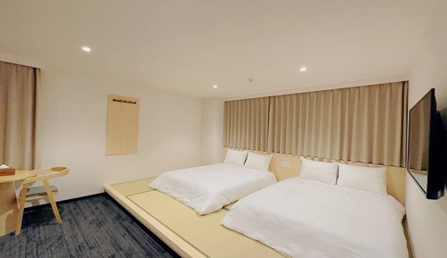 Habitación familiar con 2 camas individuales