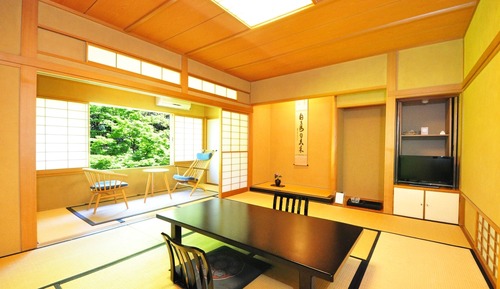 Habitación cuádruple estándar, baño privado, vistas al jardín