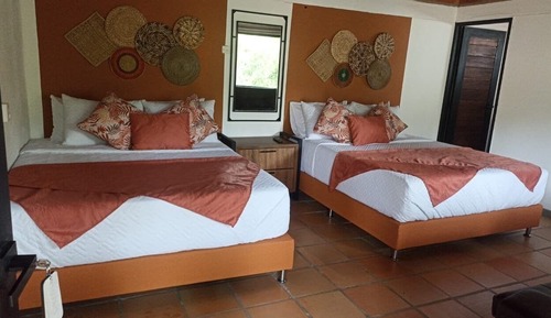 Habitación familiar con 2 camas individuales, vistas al jardín