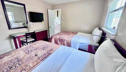 Suite familiar, varias camas, cocina básica, vistas al lago