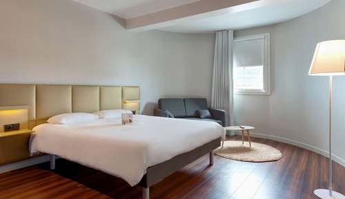 Habitación triple, varias camas