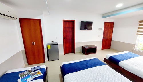 Habitación triple estándar, varias camas