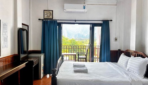 Habitación cuádruple Deluxe, balcón, vistas a la montaña