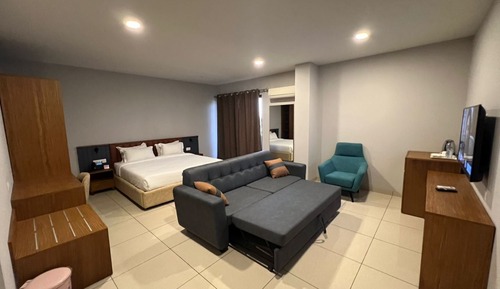 Habitación junior doble, balcón, vistas al jardín