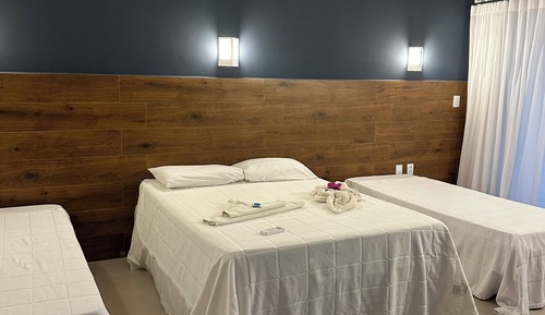 Habitación cuádruple Deluxe (Com Varanda)